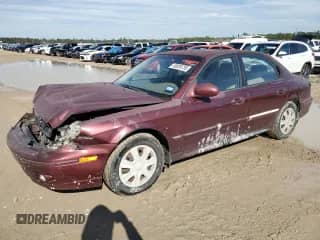 2002 Hyundai Sonata with VIN KMHWF25H62A642539, listed as a Copart auction lot 88089735 with 163,679 mi miles and Salvage title. Bid and sale history available at DreamBid. Image 1.