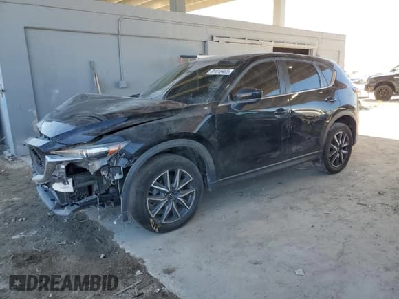 ✅ 2018 Mazda CX-5 Touring • VIN: JM3KFBCM6J0306985 • Lot: 91616465. Wystawiony na Copart z przebiegiem 106 570 mil. Bezpłatny archiwum sprzedaży aukcyjnych z USA i szczegółowy raport historii pojazdu na DreamBid. Zdjęcie 1.