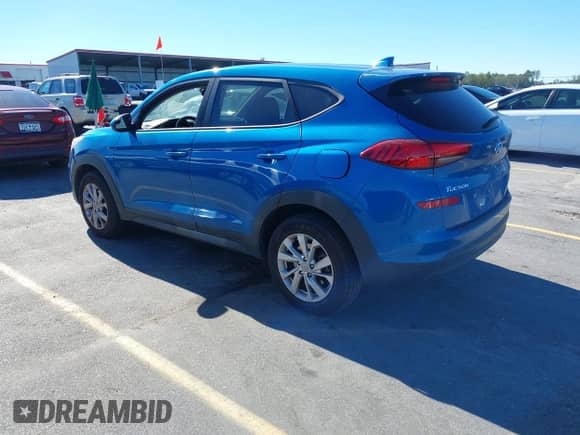 2019 Hyundai Tucson SE z VIN KM8J23A46KU004000, wystawiony jako IAAI lot #43616159 z przebiegiem 130 687 mil mil oraz . Historia ofert i sprzedaży dostępna na DreamBid. Obrazek 3.