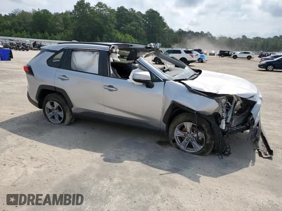 ✅ 2022 Toyota RAV4 Hybrid XLE • VIN: 4T3RWRFVXNU061095 • Lot: 69345585. Wystawiony na Copart z przebiegiem Nie podano. Bezpłatny archiwum sprzedaży aukcyjnych z USA i szczegółowy raport historii pojazdu na DreamBid. Zdjęcie 4.