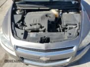 ✅ 2012 Chevrolet Malibu 1LS • VIN: 1G1ZB5E02CF275659 • Lot: 82084484. Listed on Copart with 181,421 mi. Free auction sales archive from the USA and detailed vehicle history report at DreamBid. Image 11.