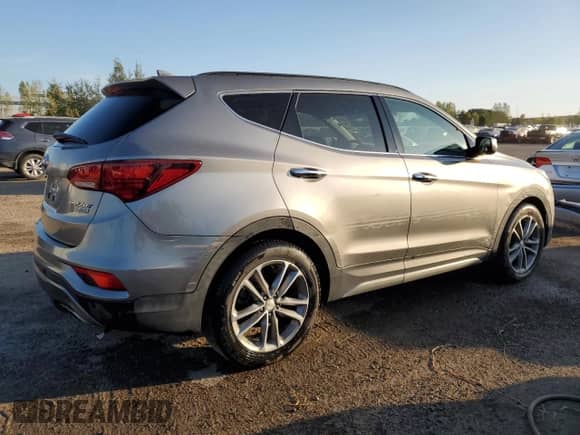 2017 Hyundai Santa Fe 2.0T with VIN 5XYZUDLAXHG453538, listed as a Copart auction lot 69907165 with 102,694 mi miles and Salvage title. Bid and sale history available at DreamBid. Image 3.