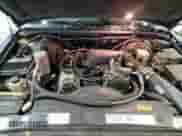 2000 Chevrolet Blazer LT with VIN 1GNDT13W6Y2372092, listed as a Copart auction lot 85784644 with 128,379 mi miles and Salvage title. Bid and sale history available at DreamBid. Image 16.