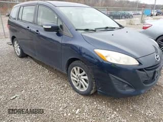 ✅ 2015 Mazda 5 Sport • VIN: JM1CW2BL2F0180279 • Lot: 43775420. Listed on IAAI with 213,622 mi. Free auction sales archive from the USA and detailed vehicle history report at DreamBid. Image 1.