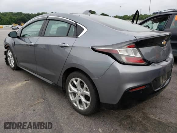 2018 Chevrolet Volt Premier z VIN 1G1RD6S51JU146000, wystawiony jako Copart lot #59950423 z przebiegiem 63 586 mil mil oraz . Historia ofert i sprzedaży dostępna na DreamBid. Obrazek 2.