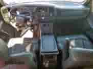 2001 Chevrolet Silverado 1500 LT z VIN 2GCEC19T511134332, wystawiony jako Copart lot #66184995 z przebiegiem 319 523 mil mil oraz Szkoda całkowita • Salvage title. Historia ofert i sprzedaży dostępna na DreamBid. Obrazek 8.