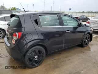 2013 Chevrolet Sonic LTZ z VIN 1G1JF6SB5D4152982, wystawiony jako Copart lot #70643904 z przebiegiem 144 912 mil mil oraz Szkoda całkowita • Salvage title. Historia ofert i sprzedaży dostępna na DreamBid. Obrazek 3.