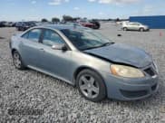 ✅ 2009 Pontiac G6 1SB • VIN: 1G2ZJ57B494267953 • Lot: 90377895. Wystawiony na Copart z przebiegiem 172 105 mil. Bezpłatny archiwum sprzedaży aukcyjnych z USA i szczegółowy raport historii pojazdu na DreamBid. Zdjęcie 4.