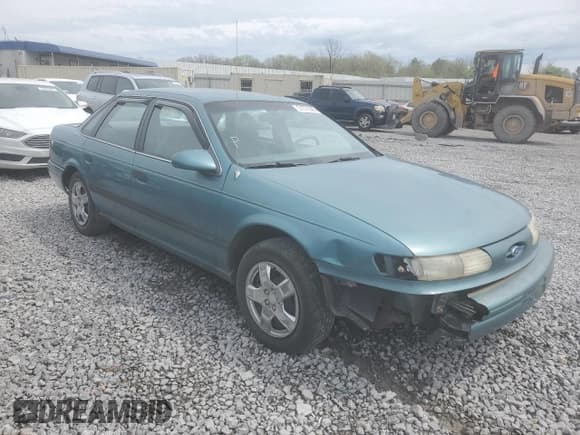 ✅ 1993 Ford Taurus GL • VIN: 1FALP5245PA272575 • Lot: 51271045. Listed on Copart with 95,380 mi. Free auction sales archive from the USA and detailed vehicle history report at DreamBid. Image 4.