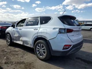 ✅ 2019 Hyundai Santa Fe SE • VIN: 5NMS23AD8KH010073 • Lot: 52181594. Wystawiony na Copart z przebiegiem 90 366 mil. Bezpłatny archiwum sprzedaży aukcyjnych z USA i szczegółowy raport historii pojazdu na DreamBid. Zdjęcie 2.