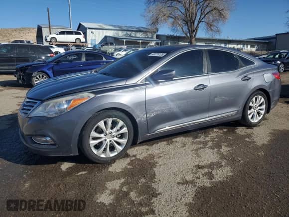 2012 Hyundai Azera с VIN KMHFG4JG4CA183714, выставлен на аукционе Copart как лот 48226105 с пробегом 120 700 миль миль и Списание • Salvage title. История ставок и продаж доступна на DreamBid. Изображение 1.