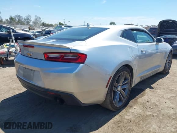 ✅ 2018 Chevrolet Camaro 1LT • VIN: 1G1FB1RX8J0128457 • Lot: 43076122. Listed on IAAI with 76,249 mi. Free auction sales archive from the USA and detailed vehicle history report at DreamBid. Image 4.