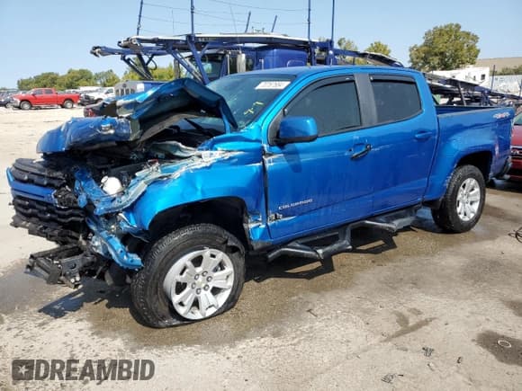 ✅ 2021 Chevrolet Colorado 4WD LT • VIN: 1GCGTCEN1M1298358 • Лот: 70767684. Опубликован ранее на Copart с пробегом 28 219 миль. Бесплатный доступ к архиву аукционных продаж из США и подробный отчёт об истории автомобиля на DreamBid. Изображение 1.