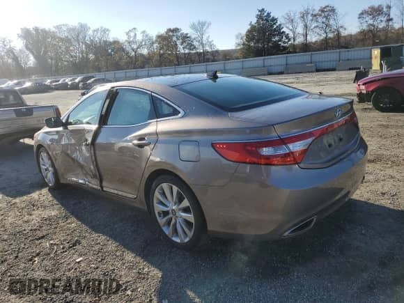 2012 Hyundai Azera с VIN KMHFH4JG3CA166027, выставлен на аукционе Copart как лот 83534904 с пробегом 87 279 миль миль и Списание • Salvage title. История ставок и продаж доступна на DreamBid. Изображение 2.