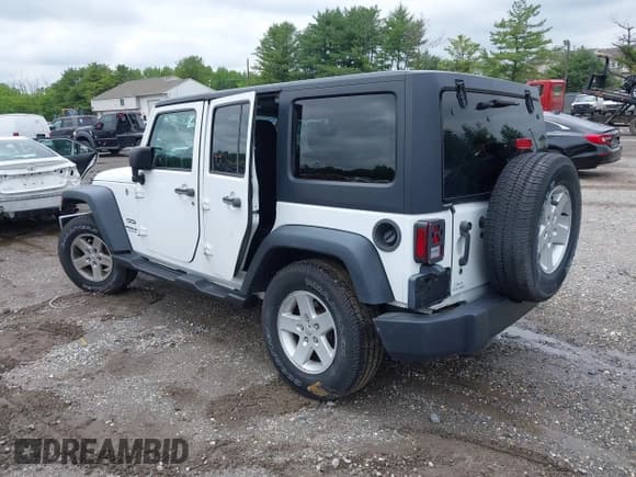 ✅ 2016 Jeep Wrangler Unlimited Sport • VIN: 1C4HJWDG7GL238107 • Lot: 42345271. Listed on IAAI with 104,540 mi. Free auction sales archive from the USA and detailed vehicle history report at DreamBid. Image 3.