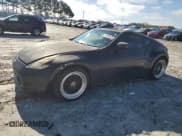 ✅ 2009 Nissan 370Z • VIN: JN1AZ44EX9M404083 • Lot: 91008375. Listed on Copart with 185,773 mi. Free auction sales archive from the USA and detailed vehicle history report at DreamBid. Image 1.