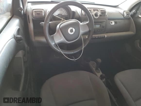 ✅ 2008 Smart fortwo Pure • VIN: WMEEJ31XX8K084149 • Lot: 69894855. Listed on Copart with Not provided. Free auction sales archive from the USA and detailed vehicle history report at DreamBid. Image 8.