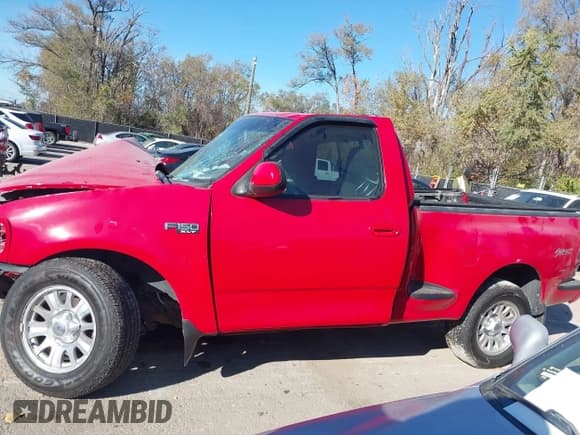 ✅ 2001 Ford F-150 XL • VIN: 1FTZF072X1KB09004 • Лот: 43604530. Опубликован ранее на IAAI с пробегом Не указан. Бесплатный доступ к архиву аукционных продаж из США и подробный отчёт об истории автомобиля на DreamBid. Изображение 14.