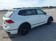 ✅ 2023 Volkswagen Tiguan SE R-Line Black • VIN: 3VVCB7AX0PM090710 • Lot: 41256904. Wystawiony na IAAI z przebiegiem 12 819 mil. Bezpłatny archiwum sprzedaży aukcyjnych z USA i szczegółowy raport historii pojazdu na DreamBid. Zdjęcie 4.