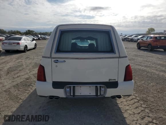 ✅ 2004 Cadillac DeVille Limousine • VIN: 1GEEH90Y74U550732 • Лот: 80014385. Опубликован ранее на Copart с пробегом 69 689 миль. Бесплатный доступ к архиву аукционных продаж из США и подробный отчёт об истории автомобиля на DreamBid. Изображение 6.