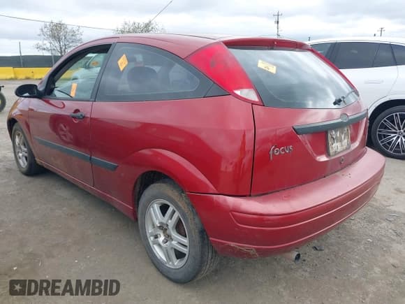 ✅ 2003 Ford Focus ZX3 • VIN: 3FAFP31Z23R187918 • Lot: 41969325. Listed on IAAI with Not provided. Free auction sales archive from the USA and detailed vehicle history report at DreamBid. Image 3.