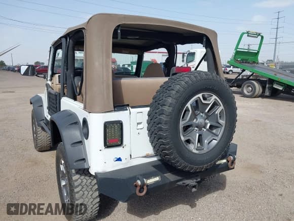 ✅ 2000 Jeep Wrangler Sahara • VIN: 1J4FA59S6YP700675 • Лот: 41751124. Опубликован ранее на IAAI с пробегом 154 727 миль. Бесплатный доступ к архиву аукционных продаж из США и подробный отчёт об истории автомобиля на DreamBid. Изображение 3.