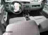 2009 Dodge Dakota SXT with VIN 1D7HE38K39S778117, listed as a Copart auction lot 80775004 with Not provided miles and Salvage title. Bid and sale history available at DreamBid. Image 8.