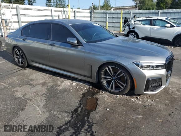 ✅ 2022 BMW 7 Series 740i xDrive • VIN: WBA7T4C03NCK85529 • Лот: 52188325. Опубликован ранее на Copart с пробегом 28 427 миль. Бесплатный доступ к архиву аукционных продаж из США и подробный отчёт об истории автомобиля на DreamBid. Изображение 4.