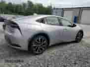 2024 Toyota Prius SE с VIN JTDACACUXR3012846, выставлен на аукционе Copart как лот 69588405 с пробегом 23 184 миль миль и Списание • Salvage title. История ставок и продаж доступна на DreamBid. Изображение 3.