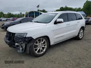 ✅ 2014 Jeep Grand Cherokee Summit • VIN: 1C4RJFJG0EC237659 • Lot: 70940905. Listed on Copart with 233,252 mi. Free auction sales archive from the USA and detailed vehicle history report at DreamBid. Image 1.