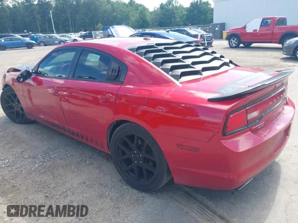 ✅ 2013 Dodge Charger RT Plus • VIN: 2C3CDXDT4DH584620 • Lot: 42682023. Listed on IAAI with 144,770 mi. Free auction sales archive from the USA and detailed vehicle history report at DreamBid. Image 3.