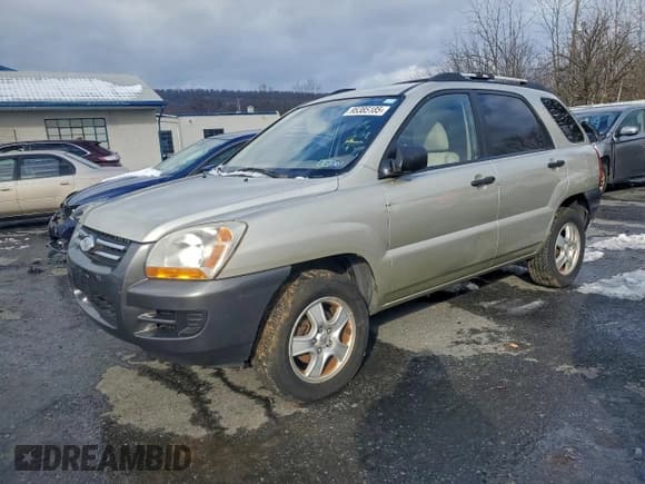 ✅ 2008 Kia Sportage LX • VIN: KNDJF724087506538 • Лот: 95385185. Опубликован ранее на Copart с пробегом 197 390 миль. Бесплатный доступ к архиву аукционных продаж из США и подробный отчёт об истории автомобиля на DreamBid. Изображение 1.