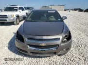 ✅ 2012 Chevrolet Malibu 1LS • VIN: 1G1ZB5E03CF210139 • Lot: 80245914. Listed on Copart with 149,598 mi. Free auction sales archive from the USA and detailed vehicle history report at DreamBid. Image 5.