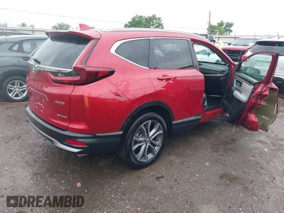 ✅ 2021 Honda CR-V Touring • VIN: 2HKRW2H9XMH663315 • Lot: 42188893. Listed on IAAI with 26,203 mi. Free auction sales archive from the USA and detailed vehicle history report at DreamBid. Image 4.