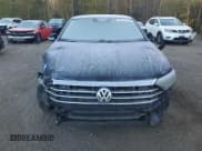 ✅ 2021 Volkswagen Jetta SEL Premium • VIN: 3VWG57BU7MM035935 • Lot: 84545125. Wystawiony na Copart z przebiegiem 61 967 mil. Bezpłatny archiwum sprzedaży aukcyjnych z USA i szczegółowy raport historii pojazdu na DreamBid. Zdjęcie 5.