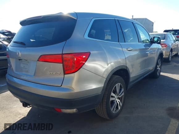 ✅ 2018 Honda Pilot EX-L • VIN: 5FNYF6H5XJB013667 • Lot: 43400037. Listed on IAAI with 111,947 mi. Free auction sales archive from the USA and detailed vehicle history report at DreamBid. Image 4.