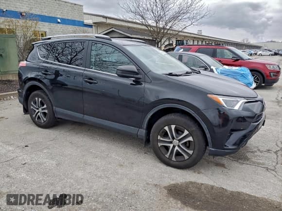 ✅ 2017 Toyota RAV4 LE • VIN: 2T3BFREV5HW551256 • Lot: 94876155. Listed on Copart with 98,347 mi. Free auction sales archive from the USA and detailed vehicle history report at DreamBid. Image 4.