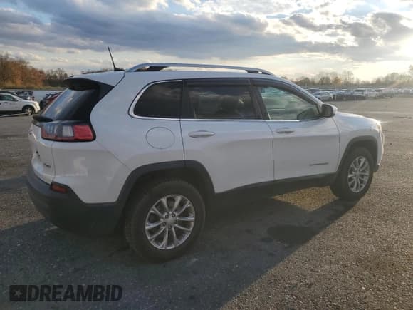 ✅ 2019 Jeep Cherokee Latitude • VIN: 1C4PJMCB4KD148759 • Lot: 90981295. Listed on Copart with 90,296 mi. Free auction sales archive from the USA and detailed vehicle history report at DreamBid. Image 3.