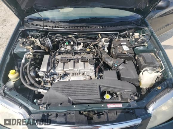 ✅ 2002 Mazda Protege DX • VIN: JM1BJ225320553643 • Lot: 67915724. Wystawiony na Copart z przebiegiem 139 899 mil. Bezpłatny archiwum sprzedaży aukcyjnych z USA i szczegółowy raport historii pojazdu na DreamBid. Zdjęcie 11.