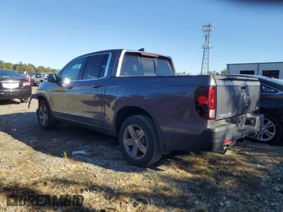 ✅ 2023 Honda Ridgeline RTL • VIN: 5FPYK3F53PB057393 • Lot: 82261105. Listed on Copart with 22,300 mi. Free auction sales archive from the USA and detailed vehicle history report at DreamBid. Image 2.