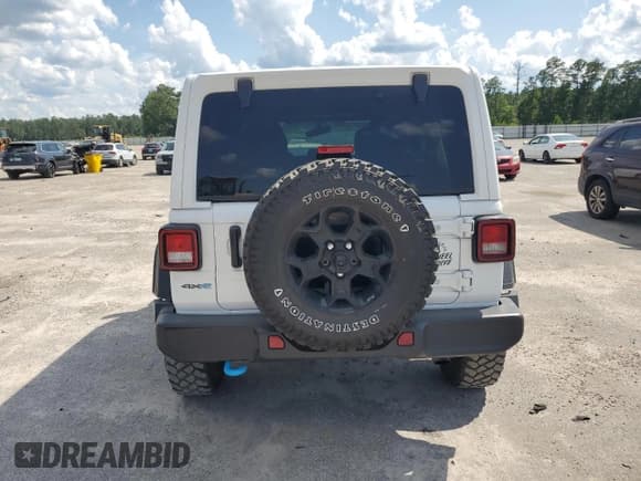 ✅ 2023 Jeep Wrangler • VIN: 1C4JJXN62PW613106 • Лот: 61717015. Опубликован ранее на Copart с пробегом 18 365 миль. Бесплатный доступ к архиву аукционных продаж из США и подробный отчёт об истории автомобиля на DreamBid. Изображение 6.