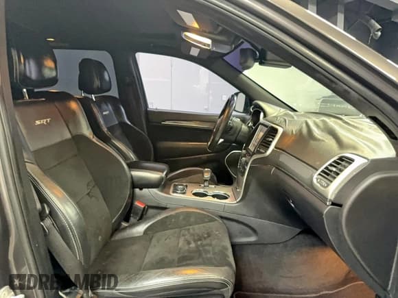 ✅ 2014 Jeep Grand Cherokee SRT-8 • VIN: 1C4RJFDJ7EC135377 • Lot: 93749405. Wystawiony na Copart z przebiegiem 115 197 mil. Bezpłatny archiwum sprzedaży aukcyjnych z USA i szczegółowy raport historii pojazdu na DreamBid. Zdjęcie 5.