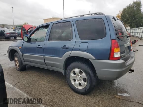 ✅ 2001 Mazda Tribute LX • VIN: 4F2CU08111KM23528 • Lot: 82774075. Listed on Copart with 130,857 mi. Free auction sales archive from the USA and detailed vehicle history report at DreamBid. Image 2.