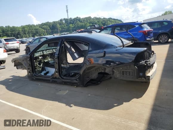 ✅ 2018 Dodge Charger R/T Scat Pack • VIN: 2C3CDXGJ9JH277496 • Lot: 63652305. Listed on Copart with Not provided. Free auction sales archive from the USA and detailed vehicle history report at DreamBid. Image 2.