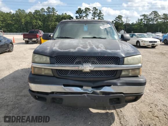 ✅ 2004 Chevrolet Silverado 1500 LS • VIN: 2GCEK13T941406722 • Lot: 59933435. Wystawiony na Copart z przebiegiem 328 796 mil. Bezpłatny archiwum sprzedaży aukcyjnych z USA i szczegółowy raport historii pojazdu na DreamBid. Zdjęcie 5.