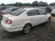 ✅ 2009 Volkswagen Passat Komfort • VIN: WVWJK73C39P035391 • Lot: 42439461. Listed on IAAI with 139,584 mi. Free auction sales archive from the USA and detailed vehicle history report at DreamBid. Image 4.