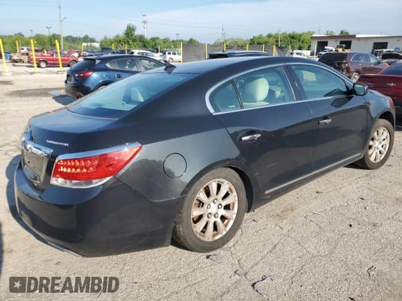 ✅ 2013 Buick LaCrosse • VIN: 1G4GA5E32DF212280 • Лот: 66701855. Опубликован ранее на Copart с пробегом 166 783 миль. Бесплатный доступ к архиву аукционных продаж из США и подробный отчёт об истории автомобиля на DreamBid. Изображение 3.