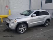 ✅ 2012 Jeep Grand Cherokee Overland • VIN: 1C4RJFCT8CC332736 • Lot: 87726165. Listed on Copart with 151,711 mi. Free auction sales archive from the USA and detailed vehicle history report at DreamBid. Image 1.