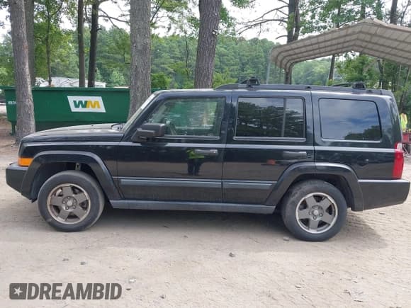 ✅ 2006 Jeep Commander • VIN: 1J8HH48N56C126051 • Lot: 42711962. Listed on IAAI with 210,509 mi. Free auction sales archive from the USA and detailed vehicle history report at DreamBid. Image 14.
