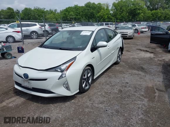 ✅ 2016 Toyota Prius Four • VIN: JTDKARFUXG3519800 • Лот: 42362865. Опубликован ранее на IAAI с пробегом 131 298 миль. Бесплатный доступ к архиву аукционных продаж из США и подробный отчёт об истории автомобиля на DreamBid. Изображение 2.
